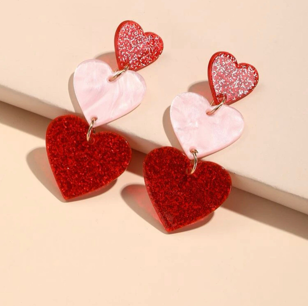 Two toned heart drop earrings